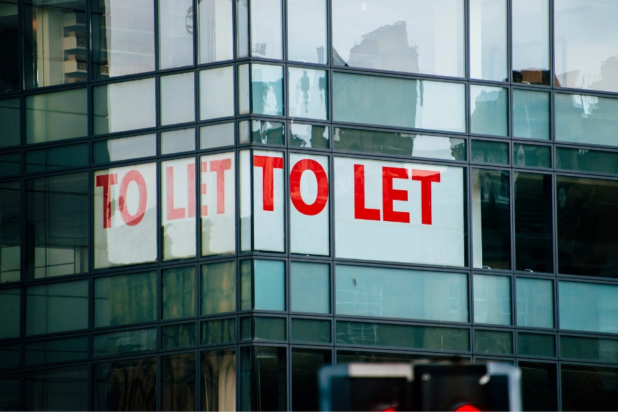 To let sign in office window