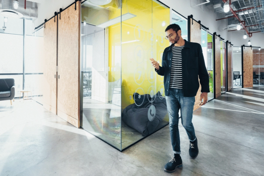 Man walking through an empty office